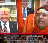 Hindu priests Swami Vedmurstinand Saraswati in India pray for Donald Trump victory in US elections