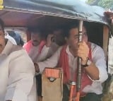 KTR rides in Auto to Indira park