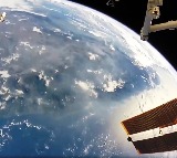 Walking in space looking at Earth Here is the video