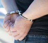 Four arrest in Law student