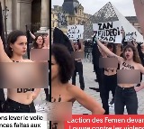 Topless women protest against gender violence in Paris
