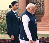 Kangana Ranaut shares photo of woman commando walking with PM Modi