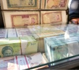 iran rial hits record low battered by regional tensions and energy crisis