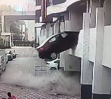 Car Crashes Through First Floor Parking as Driver Accidentally Engages Reverse Gear in Pune Viral Video