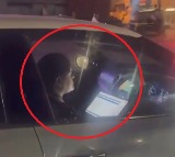 Bengaluru woman works while driving car