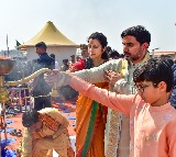 Minister Nara Lokesh and Brahmani Distribute Clothes to Brahmins at Kumbh Mela