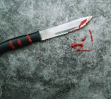 Man cuts young man hand for sending messages to his wife