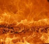 Fire catches in car while going Yadagirigutta