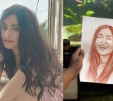 Ada Sharma Fan Draws Portrait with Blood