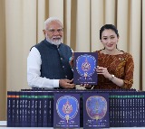 PM Modi presented with 80-volume World Tipitaka phonetic recitation by Thai counterpart