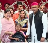 Akhilesh Yadav felicitates Ananya, the girl who saved her books during demolition drive