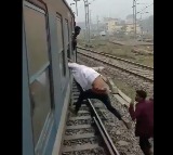 Viral Video: Phone Thief Gets Caught, Punished by Passenger on Moving Train