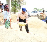 Medak District Collector Turns Farm Laborer, Sieves Paddy at Procurement Centre