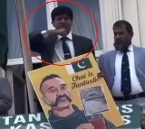 Pakistani diplomat's throat-slitting gesture sparks outrage in London protest
