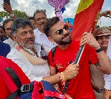 RCB team gets grand welcome at B'luru airport, Shivakumar gifts Kannada flag to Virat Kohli