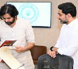Nara Lokesh presents Yuva Galam book to Deputy CM Pawan Kalyan