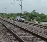 Woman drives car on railway track in Telangana