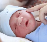 Li in China shocked by unexpected birth after stomach pain