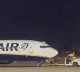 Ryanair Passengers Jump from Plane Wing After Fire Alarm in Spain