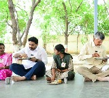 Nara Lokesh Picks Up Chandrababus Plate Showing Respect