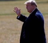 Trump visits Texas flooded area, dismissing criticism on alerts