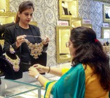 Gold falls marginally, silver prices jump
