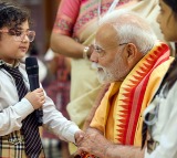 PM Modi celebrates Raksha Bandhan at 7 LKM; children & Brahma Kumaris tie 'rakhi' to him