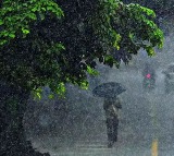 Hyderabad Wakes Up To Rain Causing Traffic Snarls