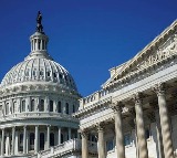 US government shuts down in political standoff with dim prospects of early deal (Lead)