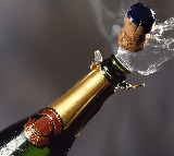 Fire in DCM in Hyderabad Locals scramble for liquor bottles