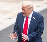 Trump says some furloughed workers might not get back pay