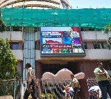 Sensex, Nifty post mild gains amid positive global cues