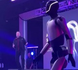 Elon Musk dances with robot after shareholders approve package