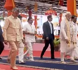 Narendra Modi Visits Puttaparthi Welcomed by Chandrababu and Pawan