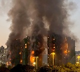 Hong Kong Fire Cigarette Butt Blamed for 128 Deaths