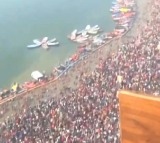 Flower petals showered on devotees at Triveni Sangam, as thousands take holy dip on Mauni Amavasya