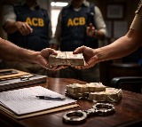 Two Andhra police officers caught accepting Rs 3 lakh bribe