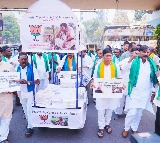 BJP MLAs protest at Telangana Assembly with pushcart