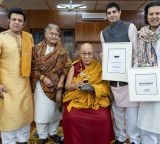 Dalai Lama formally receives Grammy from Amjad Ali Khan at 90