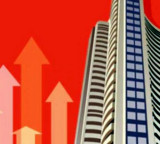Indian markets trade higher ahead of RBI policy decision