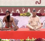 Chandrababu Naidu practices yoga with Baba Ramdev in Vijayawada