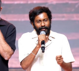 Buchi Babu Sana says I used to write letters to Chiranjeevi at Peddi success event