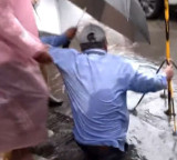 Mumbai Rains Havoc Worker falls into manhole in presence of Mayor Ritu Tawade