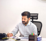 Revanth Reddy bumper gift for employees 12 crore free insurance without premium