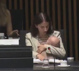 Sweden minister attends key meeting with 3 month old son setting an example