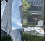 Sensation in China as small plane hits 108 story building