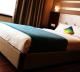 Hotel Bed Runner real reason for the colorful cloth on beds