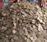 Konde Raghupathi buys bike with 110 lakh in 10 rupee coins