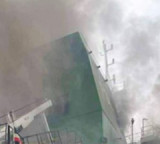 Container ship hit, catches fire off Oman: UKMTO