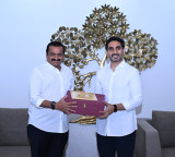 Bandla Ganesh invites Nara Lokesh for daughter Janani marriage ceremony